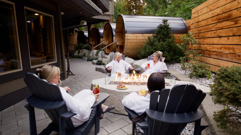Four people enjoying the spa and saunas at Tigh-Na_Mara's Grotto Spa